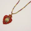 Pendentif Hypnochic rouge brodé à la main.