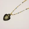 Pendentif Hypnochic noir brodé à la main