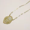 Pendentif Hypnochic brodé avec oeil doré