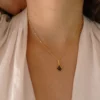Pendentif Muja Juma plaqué or et grenat. – Image 3
